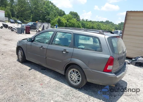 2003 Ford Focus Se/Ztw z USA, uszkodzony, nr VIN 1FAFP36313W334084